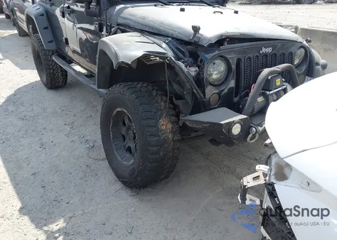 2008 Jeep Wrangler Unlimited Rubicon из США, поврежденный, VIN 1J4GA69148L591156